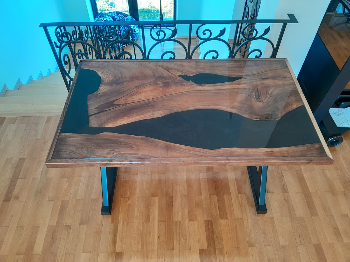 Dinner table for 4. Walnut - black epoxy resin.